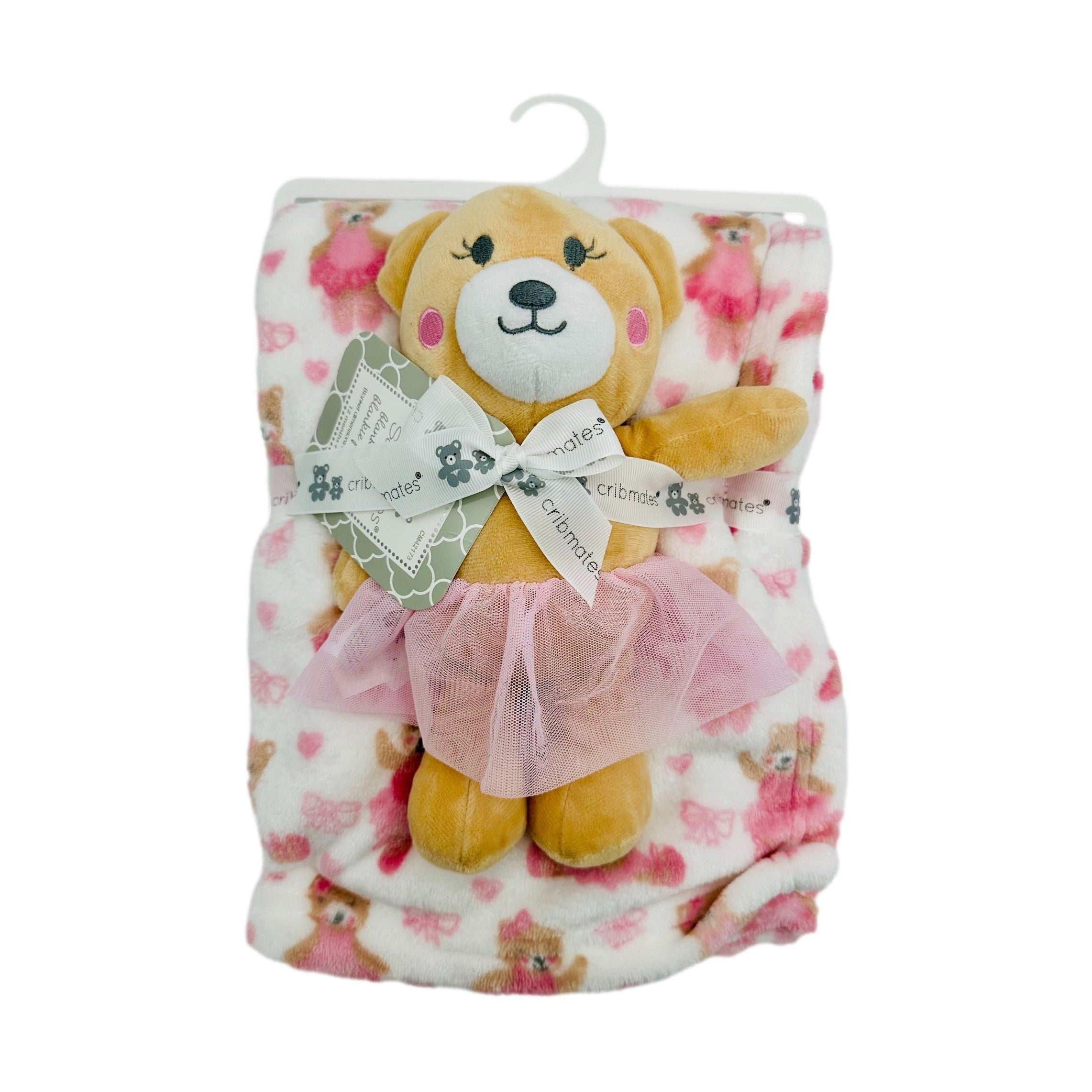 Wrapped blanket with teddy bear wearing pink tutu.